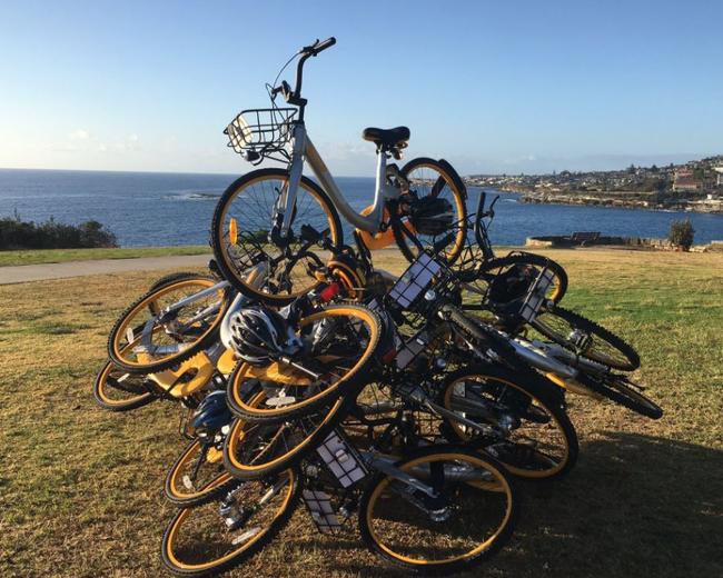 Hire bikes playing stacks on the mill. This coincided with the Sculptures by the Sea. Picture: Jeremy Scott