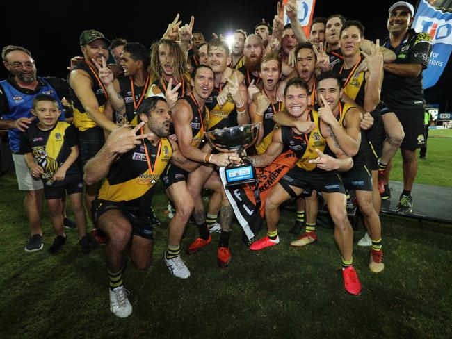 The Nightcliff Tigers celebrate their first back to back premiership at the 2019/20 NTFL Grand Final. Picture: GLENN CAMPBELL