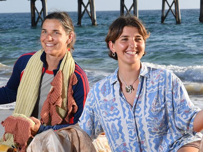 Artists Isadore Glockner-Karo and Heidi Karo pose for a photograph at Port Noarlunga, Adelaide on Wednesday the 2nd of October 2019. The mother-daughter duo have an interactive performance piece, "Harvest" as part of the SUE Festival during October.   (AAP/Keryn Stevens)