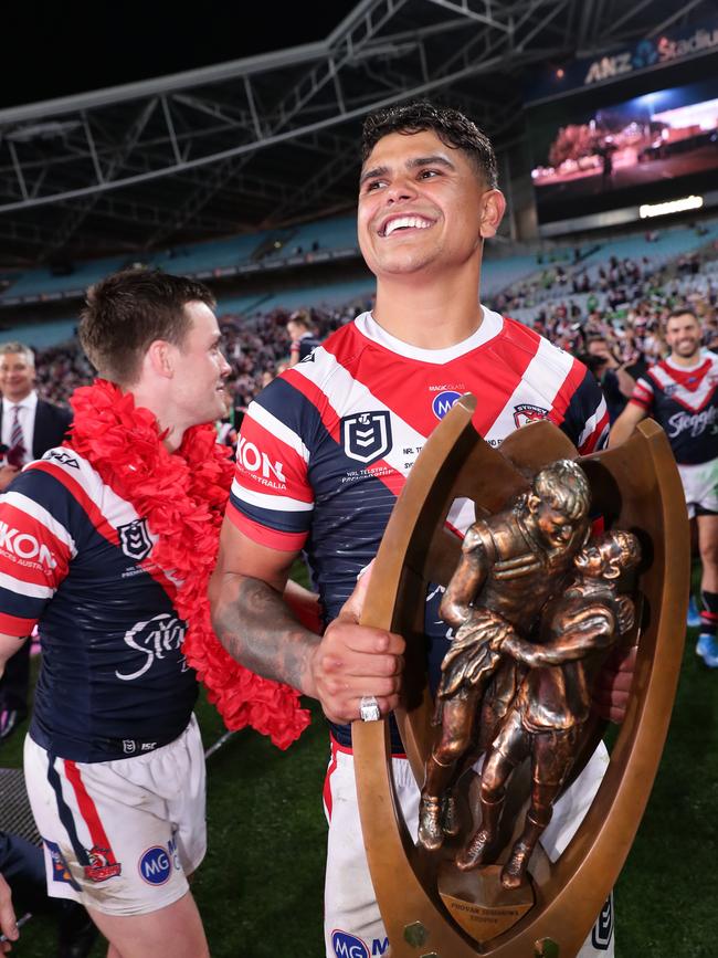 Latrell Mitchell with the trophy.