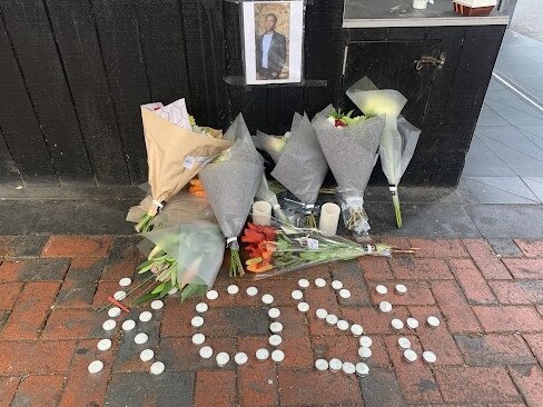 Tributes on Bourke street.