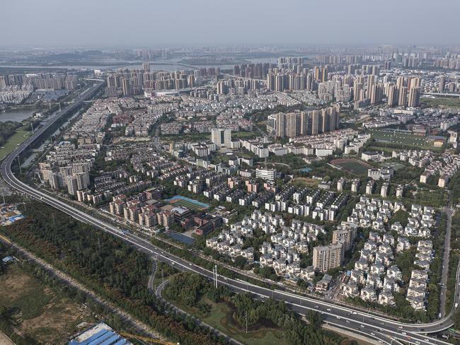 WUHAN, CHINA - SEPTEMBER 23: (CHINA OUT) An aerial view of the Evergrande changqing community on September 23, 2021 in Wuhan, Hubei Province, China. In 2015, Evergrande real estate acquired four super large projects in Haikou, Wuhan and Huizhou, with a total construction area of nearly 4 million square meters and a total amount of 13.5 billion yuan. Evergrande, China's largest property developer, is facing a liquidity crisis with total debts of around $300 billion. The problems faced by the company could impact China’s economy, and the global economy at large.（Photo by Getty Images)
