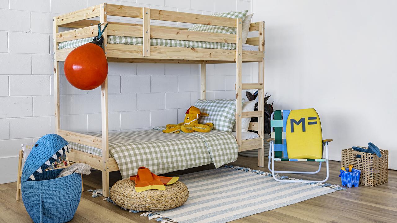 There is queen bed and bunks beds in an open plan space. Picture: Luke Marsden