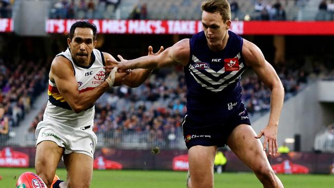 Ryan Nyhuis shows his strength and discipline in this encounter with Adelaide Crow Eddie Betts in a 2018 game at Perth’s Optus Stadium. Picture: Will Russell/AFL Media/Getty Images.