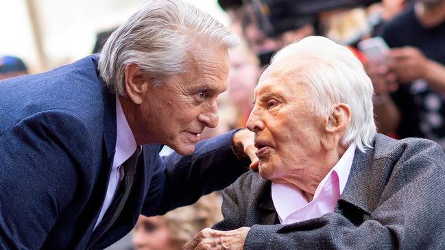 Actor Kirk Douglas with his son, Michael. Picture: Valerie Macon/AFP