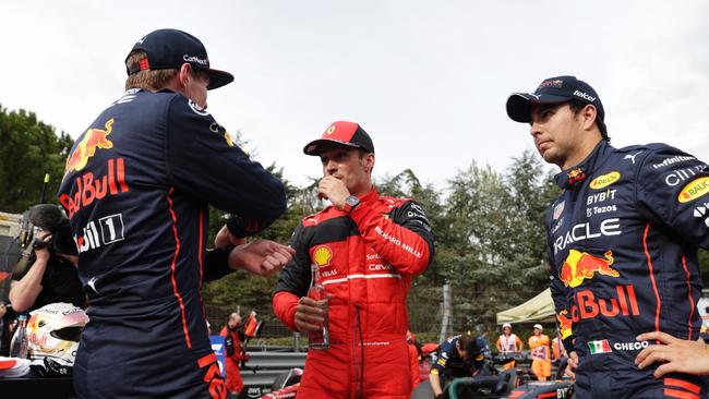 Sprint winner Max Verstappen (L) chats with Ferrari’s Charles Leclerc and third-placed Sergio Perez. Picture: Getty