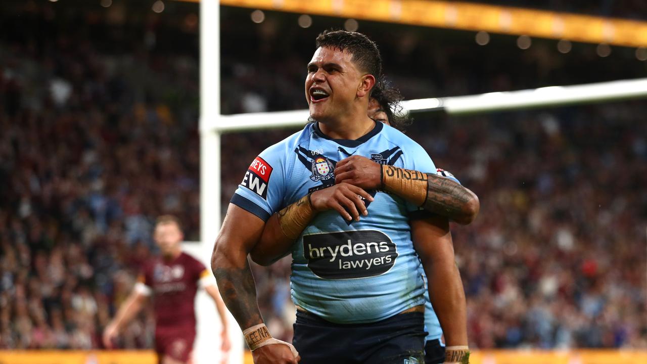 BRISBANE, AUSTRALIA - JUNE 27: Latrell Mitchell of the Blues celebrates after scoring a try with Brian To'o of the Blues during game two of the 2021 State of Origin series between the Queensland Maroons and the New South Wales Blues at Suncorp Stadium on June 27, 2021 in Brisbane, Australia. (Photo by Chris Hyde/Getty Images)