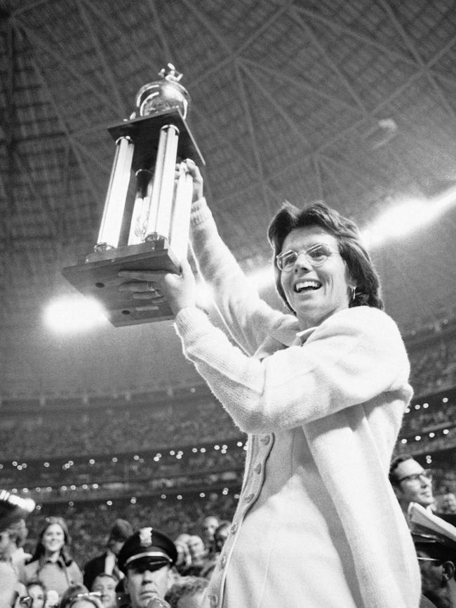 King holds the winner's trophy. King beat Riggs 6-4, 6-3, 6-3. Pic: AP.