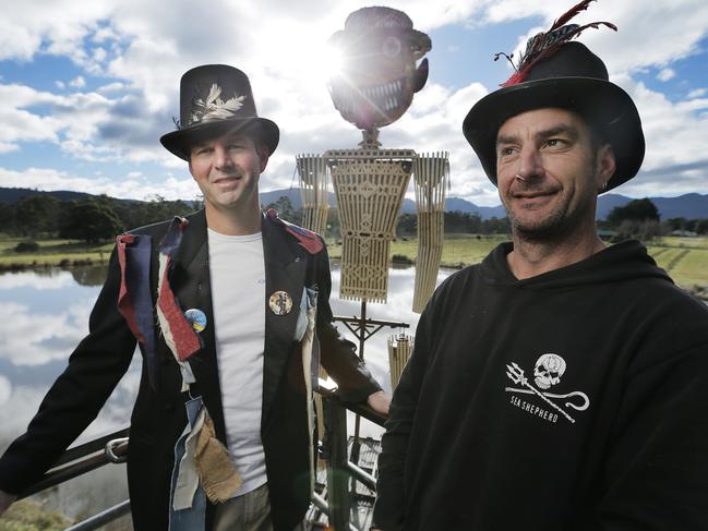 Andrew Smith, left, and Burning Man creator Marcus Gibbon put some finishing touches on the effigy ahead of this year’s Mid-Winter Festival. Picture: MATHEW FARRELL