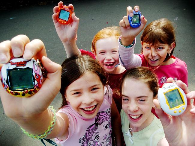 Young Aussie girls Isabel, Eiilidh, Sarah and Jarrah proudly display their Tamagotchi toys back in 2005.