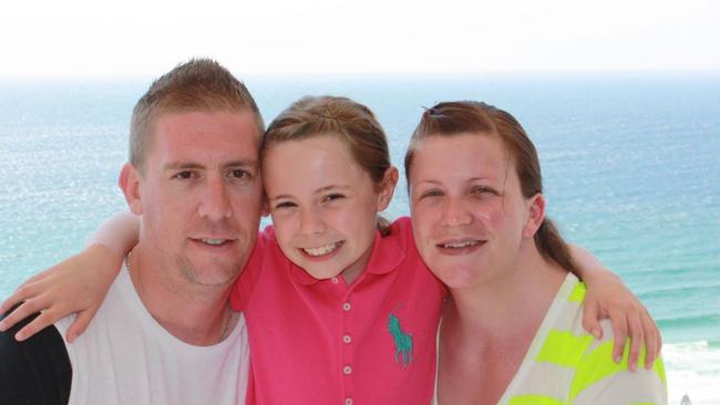 Dave Turner with his wife Kate Goodchild, who died in the Dreamworld tragedy, and their daughter Ebony, who miraculously survived.