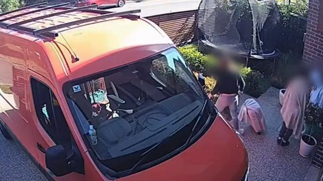 CCTV footage shows the guests, a woman and three children leaving the house with what appears to be Mr Dawe's belongings. Picture: 9 News Adelaide