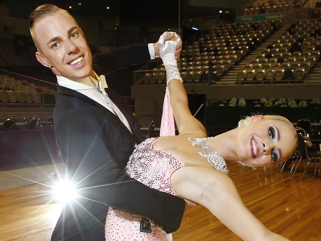 Over 1200 athletes will travel from around the world and from across Australia, to take part in the only international DanceSport event to be held in the Oceanic region, The Australian DanceSport Championship. On the weekend of 5 to 7 December at Hisense Arena. Melbourne dancers Rhett Watts and Ashleigh Tibb competing in the Adult Open Standard Ballroom.       Picture: David Caird.