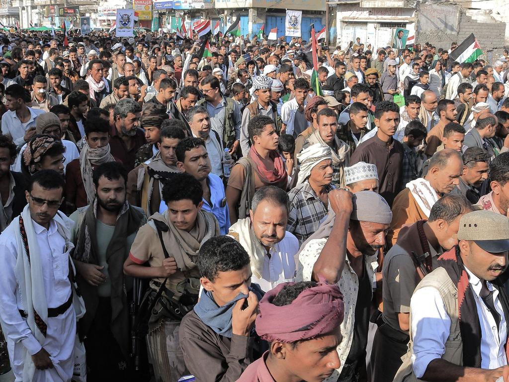 People take to the streets of the Yemeni Red Sea city of Hudeida, to condemn the overnight US and British forces strikes on Houthi rebel-held cities. Picture: AFP