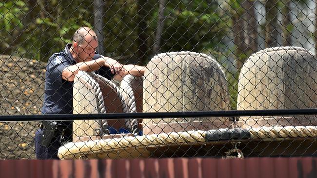 A police officer takes a look at a raft that was used by the Thunder River Rapid ride in the days following the October 2016 tragedy. Picture: NIGEL HALLETT