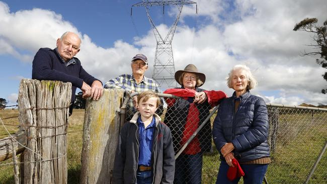 (From left) Russell Erwin, Garry Wakim, Virginia McCallum and her grandson Luca Morning, 7, and Christine Hughes oppose Transgrid's plan for compulsory acquisition of their land in Bannister. Picture: Jonathan Ng