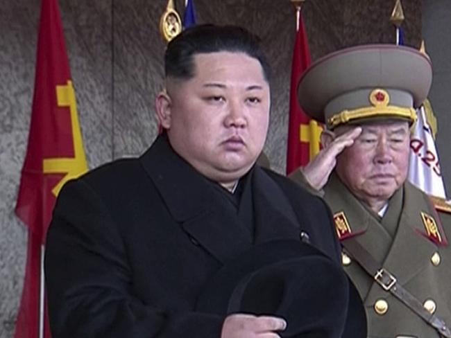 In this image made from video by North Korea's KRT, North Korean leader Kim Jong Un, center, attends a military parade in Pyongyang, North Korea Thursday, Feb. 8, 2018. North Korea held the military parade and rally on Kim Il Sung Square on Thursday, just one day before South Korea hosts the opening ceremony of the Pyeongchang Winter Olympics. (KRT via AP Video)