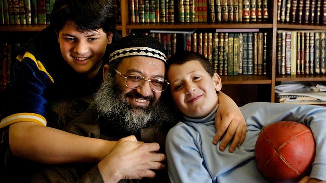 Sheik Mohammed Omran with two of his sons Ayman (13yrs), and Usama (8yrs) on 6 September 2003. SUNDAY AGE NEWS Picture by CRAIG SILLITOE