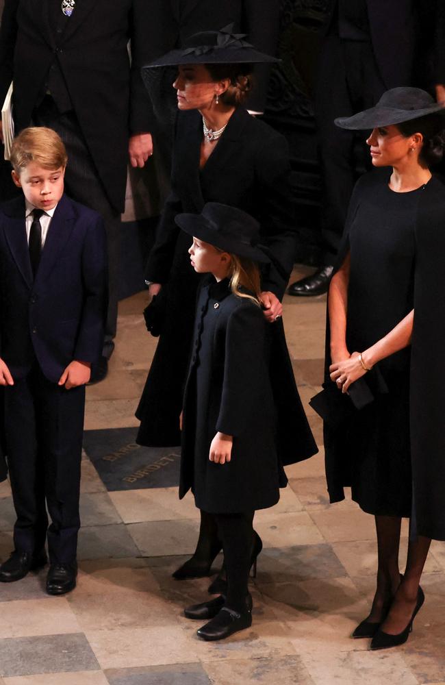 Catherine, Princess of Wales, Meghan, Duchess of Sussex, Prince George and Princess Charlotte. Picture: Getty Images