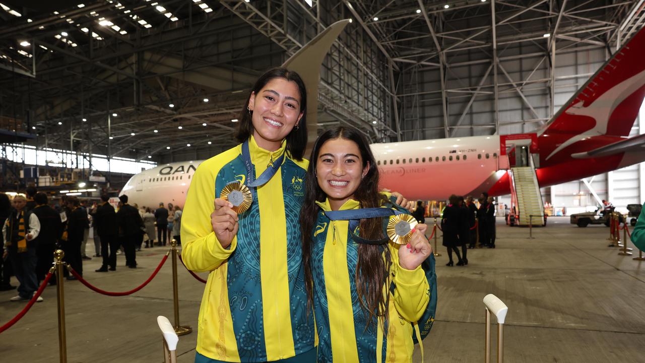 Saya Sakakibara and Arisa Trew after arriving home. Picture: Rohan Kelly