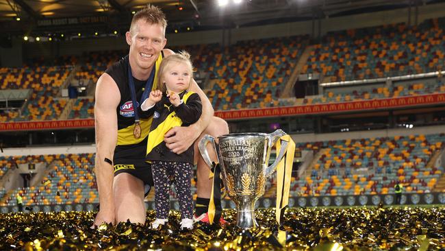 Jack Riewoldt celebrates with daughter Poppy. Not all kids could stay up that late. Picture: Michael Klein