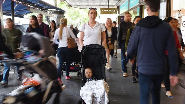 Nadia Dobromilsky with her son Ben (10 months) on Swanston Street opposite the Melbourne Town Hall. Picture: Josie Hayden