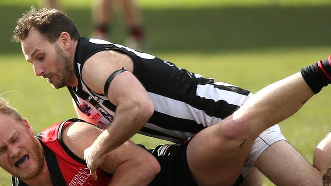 Riddell FL: Riddell v Wallan: Liam Berry of Riddell is tackled by Steven Boyall of Wallan on Saturday, July 31, 2021 in Riddells Creek, AustraliaPhoto: Hamish Blair