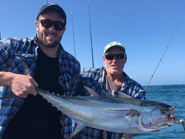 Wallabies lock Izack Rodda with his father Jon on a fishing trip. Picture: Facebook