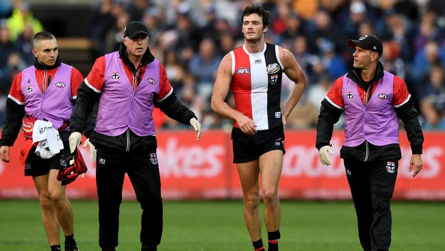 Dylan Roberton is helped off the ground. Picture: AAP