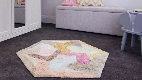 The colourful rug added to their already fun and colourful room. Source: The Block