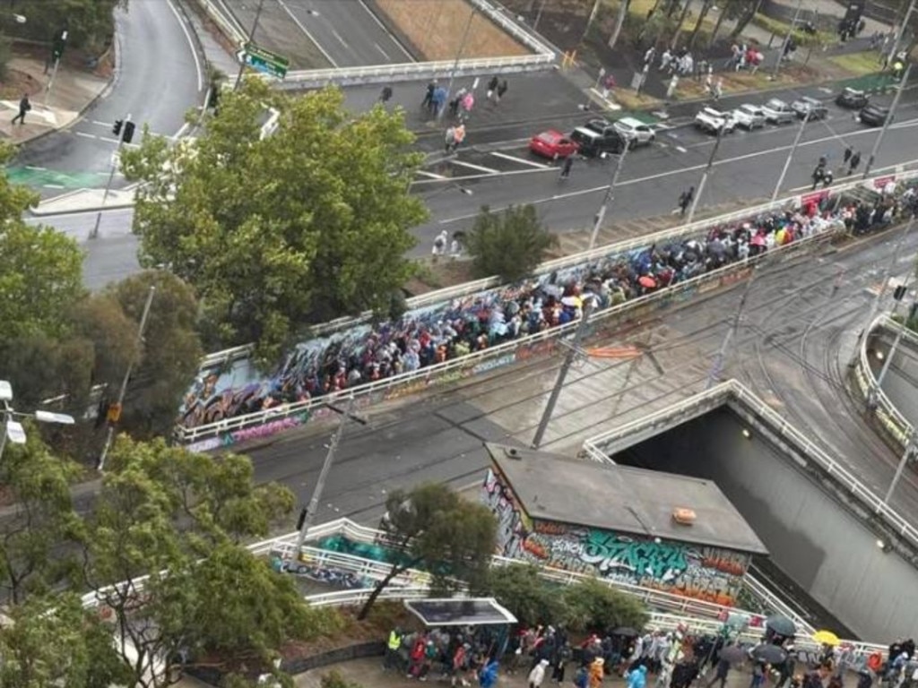 Fans lining up for trams outside the F1 Grand Prix.