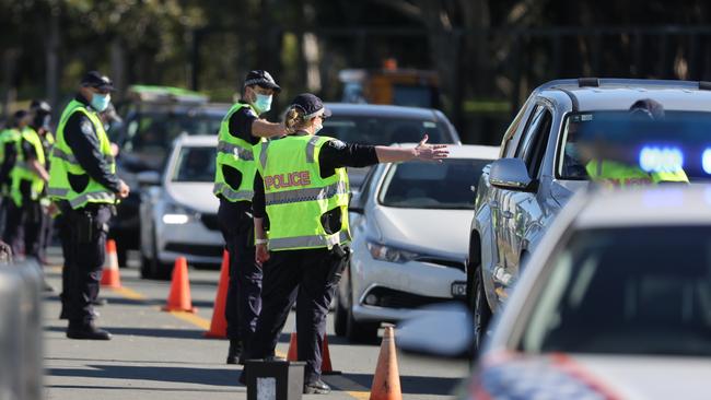 Police Covid ‘RBT’ on the Gold Coast Highway at Main Beach checking for essential travel. Picture: Nigel Hallett