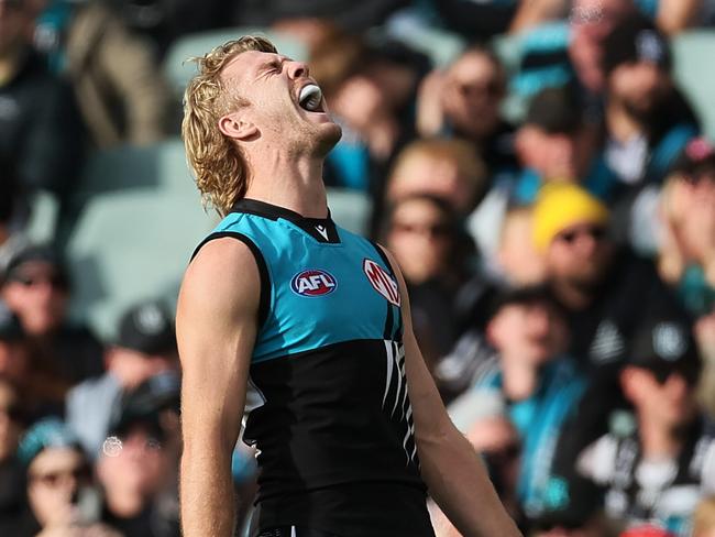 ADELAIDE, AUSTRALIA - JUNE 22: Jason Horne-Francis of the Power reacts after missing a goal during the 2024 AFL Round 15 match between the Port Adelaide Power and the Brisbane Lions at Adelaide Oval on June 22, 2024 in Adelaide, Australia. (Photo by James Elsby/AFL Photos via Getty Images)