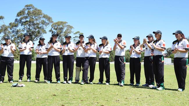 The First XI celebrate getting their baggy blacks.