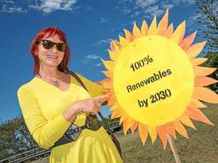 AROUND 200 anti-coal protesters dressed in yellow rallied at the Jetty foreshore in a show of 'community support' for renewable energy. Picture: Rob Cleary