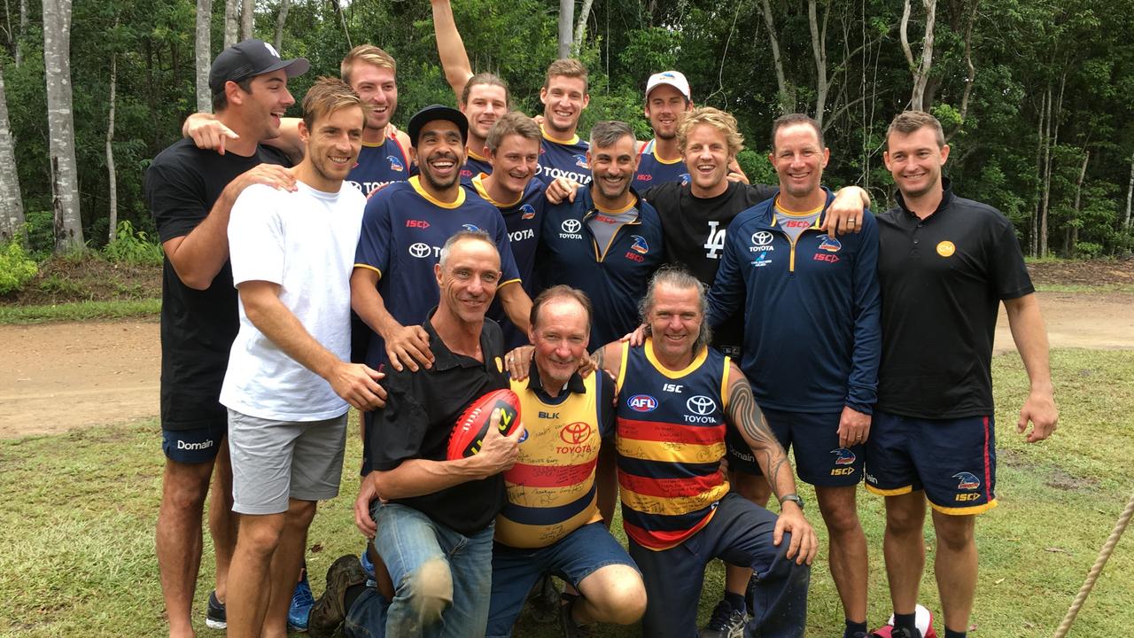 Adelaide Crows senior players and coaches with facilitators Max Witsenhuysen, Gary Simpson and Wolfgang Wildgrace after the club's 2018 pre-season camp on the Gold Coast.