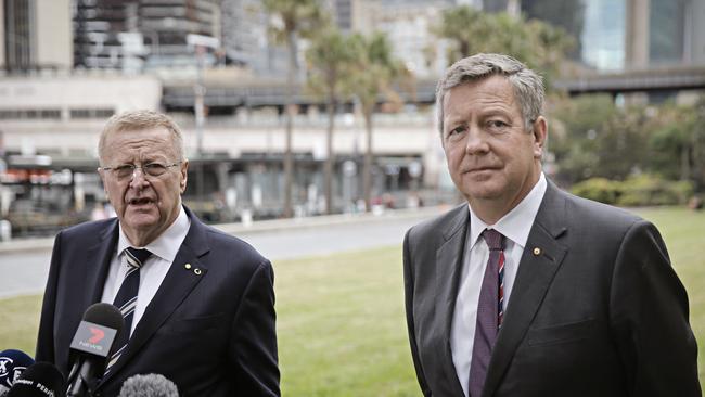 Australian Olympic Committee president John Coates, left, and chief executive Matt Carroll speaking to the media at Sydney’s Circular Quay on Satruday. Picture: Adam Yip