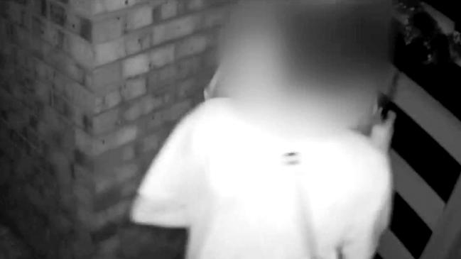 A still image from the Lovells’ CCTV camera footage of the fatal home invasion. Photo: Supplied – Queensland Courts.