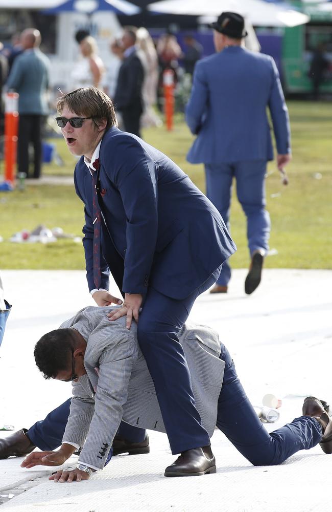 Nice way to ruin those suits for next year. Picture: Darrian Traynor/Getty Images