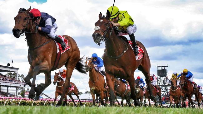 Almandin, left, edges out Heartbreak City in a thrilling finish. Picture: George Salpigtidis