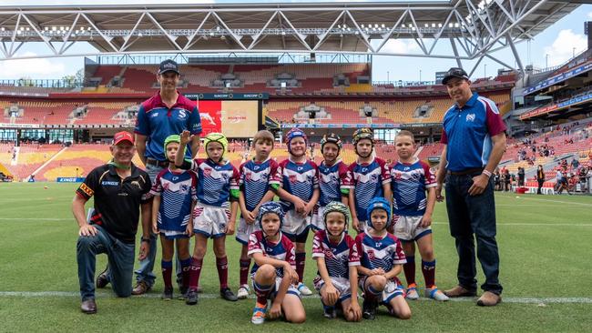 Coaches Scott Walsh and Paul Eakin with the Roma Saints Junior Under 8s team for their match ahead of the Dolphins inaugural game at Suncorp Stadium. Picture: Dolphins Rugby League.