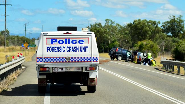 Emergency services at a fatal crash involving three vehicles just north of the Yabulu overpass. Picture: Alix Sweeney