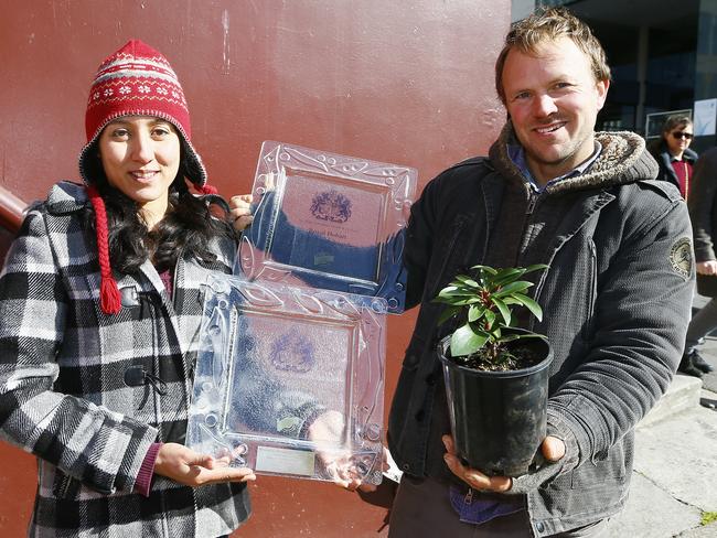 Corinne Ooms and Chris Chapman with some of the awards for their pepperberry products.