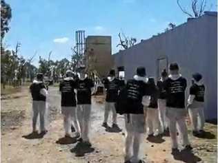 Animal activists storm a Millmerran feedlot and dairy wearing shirts that say "meat the victim". Picture: contributed