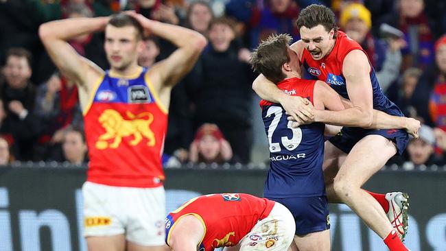The heartbreak and the jubilation on full time at the MCG. Picture: Mark Stewart