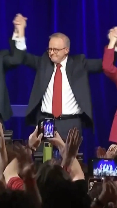 Albo celebrates with his son and partner after election victory