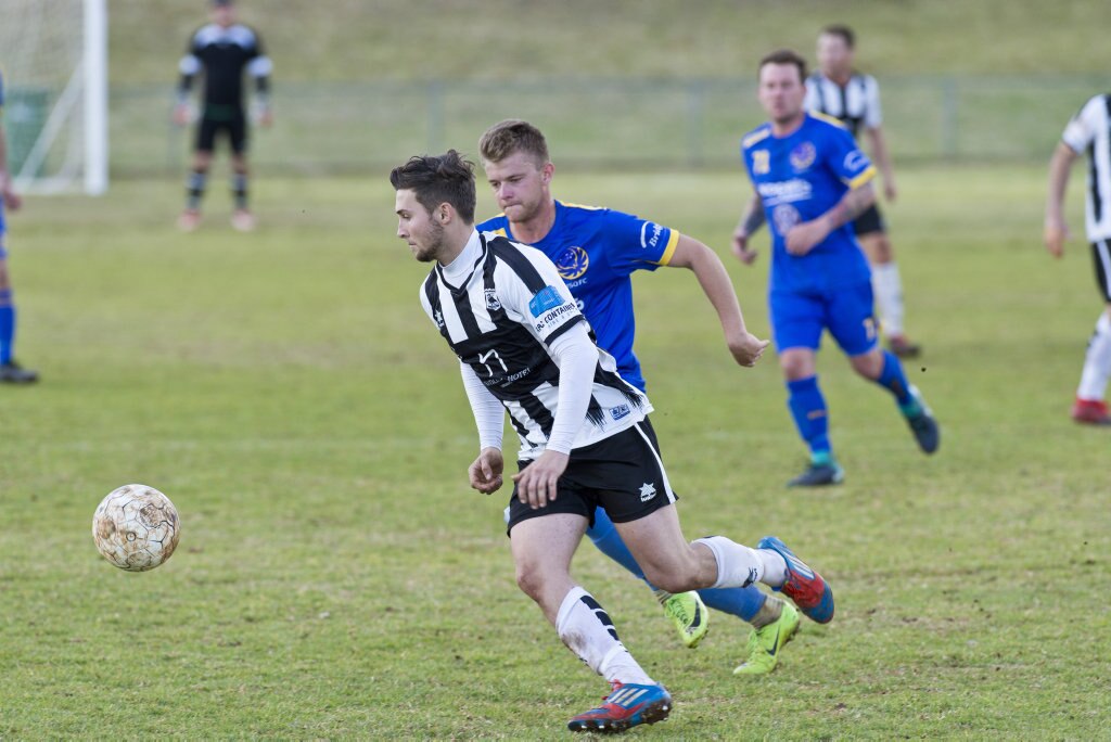 Nik Lawson (left) of Willowburn and Jacob Stoner of USQ FC in Toowoomba Football League Premier Men semi-final at Commonwealth Oval, Sunday, August 26, 2018. Picture: Kevin Farmer