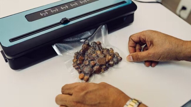 De Oliveira packages gallstones. Picture: Fábio Setti for WSJ