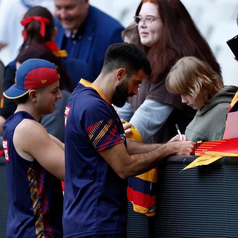 Wayne Milera signs autographs during the Adelaide Crows training session at the MCG Picture: Michael Willson/AFL Photos via Getty Images