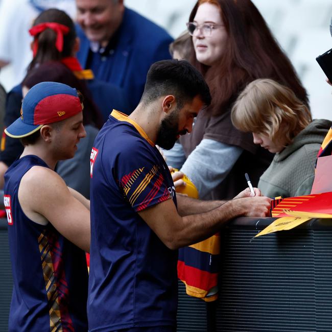 Wayne Milera signs autographs during the Adelaide Crows training session at the MCG Picture: Michael Willson/AFL Photos via Getty Images